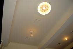 A view of the ceiling, showing the new plaster work and replacement light fixture. - , Utah